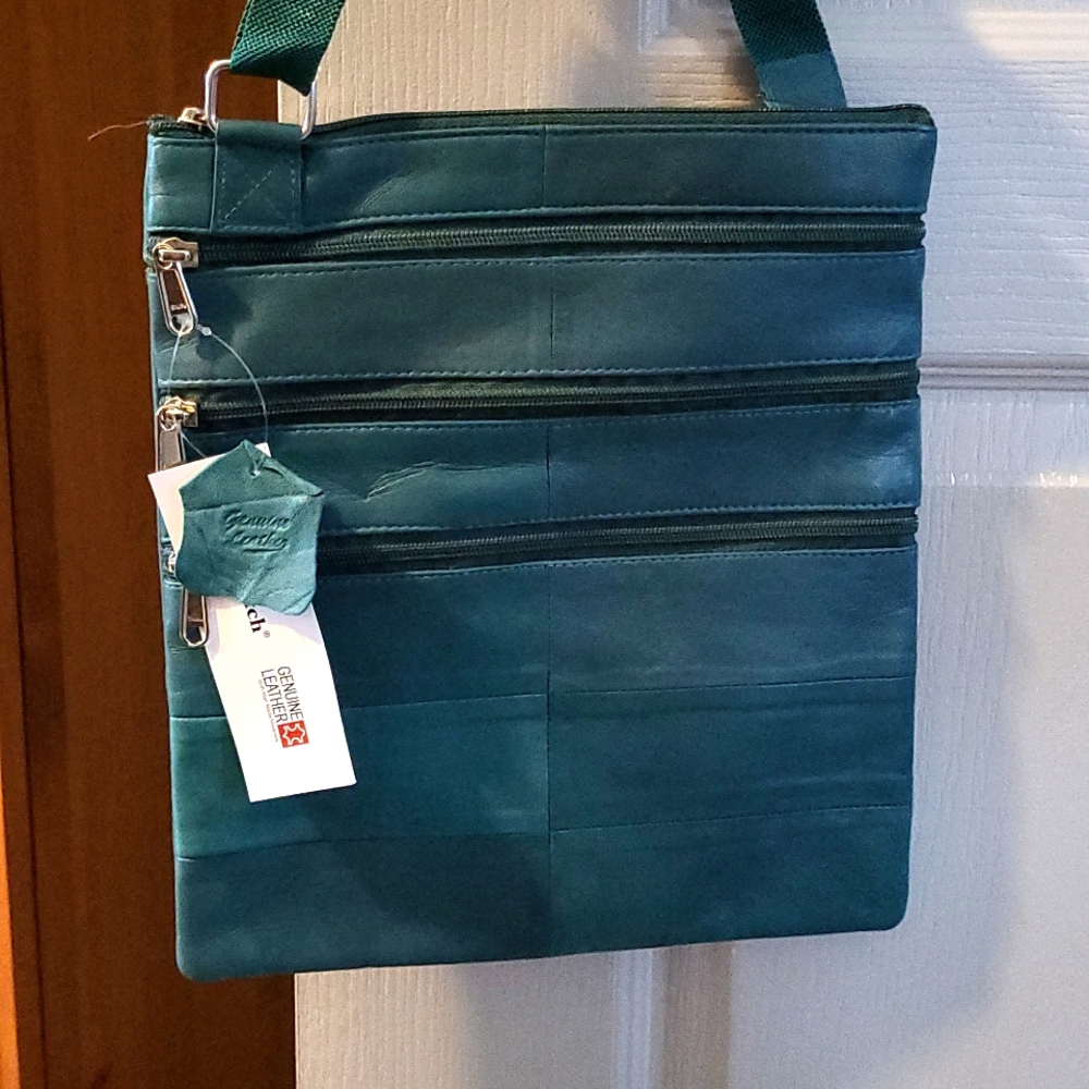 Genuine leather cross body purse.